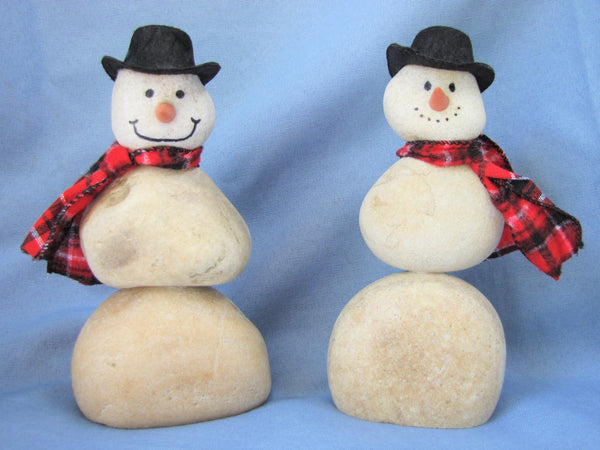 Snowman made of Stacked Stone - With Black Hat and Plaid Scarf