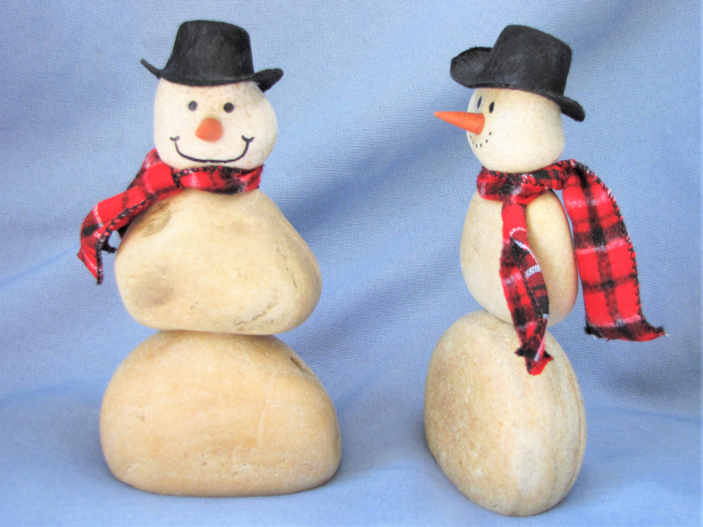 Snowman made of Stacked Stone - With Black Hat and Plaid Scarf