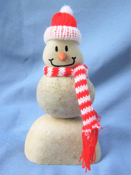 Snowman with Red Santa Hat, Made of Stacked Stone